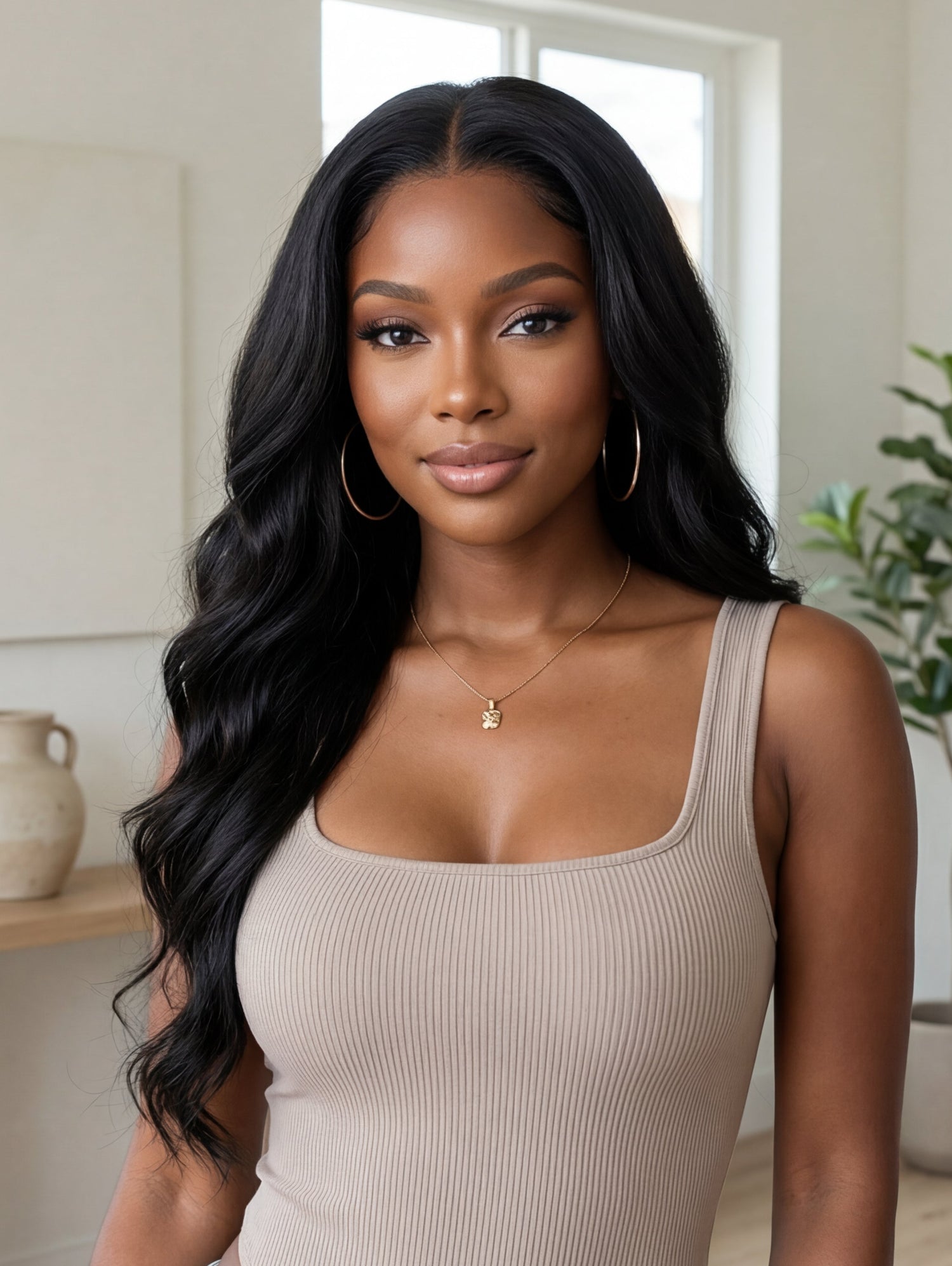 Model wearing the Wig Outlets 13x6 Lace Front Natural Black Body Wave Wig, showcasing the deep, rich natural black color with soft, bouncy body wave curls. The lace front creates a flawless, realistic hairline, while the body wave texture adds volume, movement, and a glamorous, natural look.